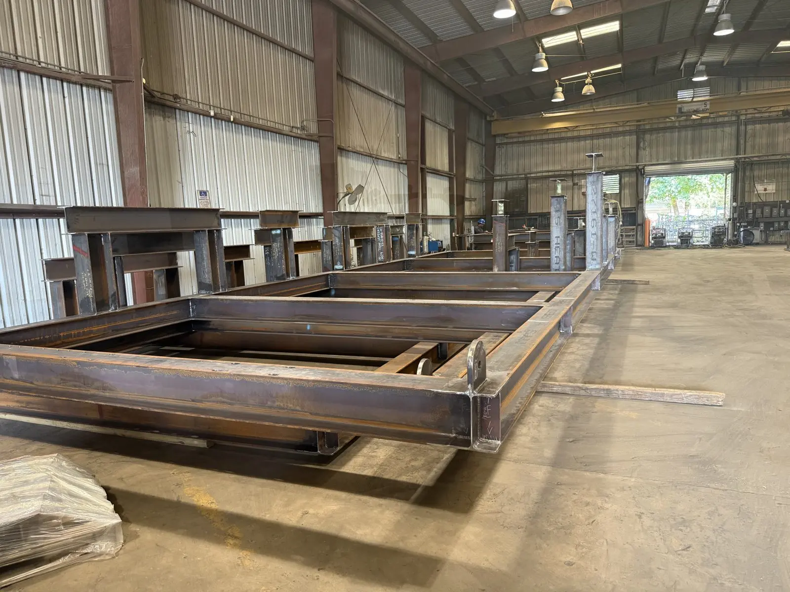 Large welded equipment skid frame in the All Pro Energy Solutions shop